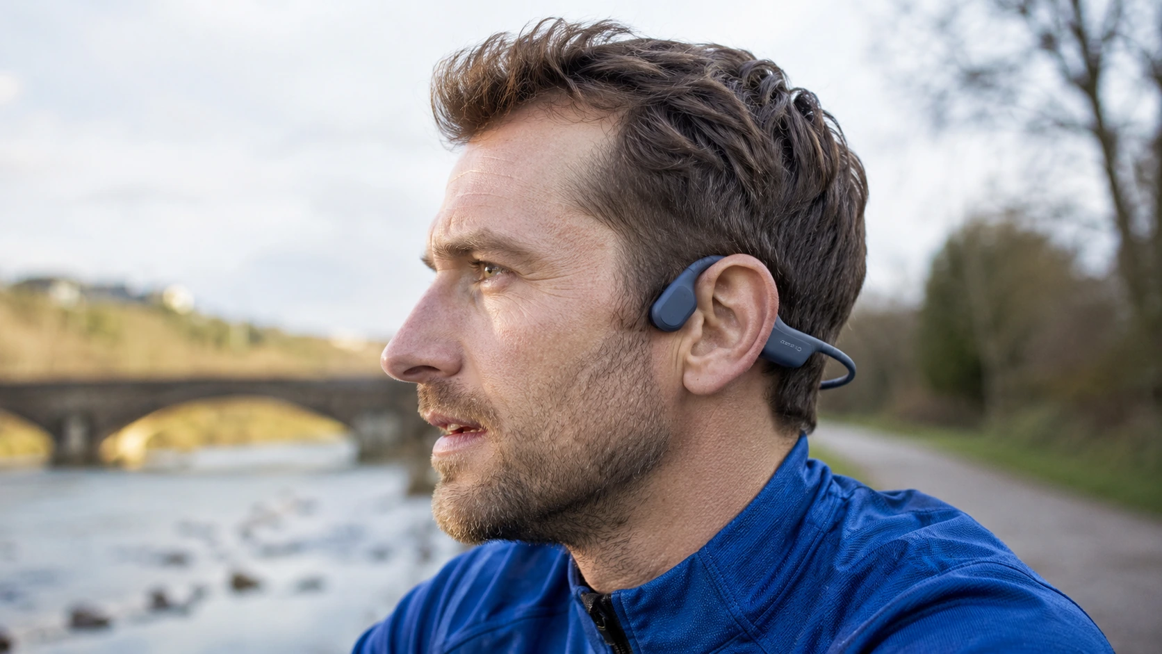 Photorealistic shortlist image for Best Bone Conduction Headphones in the UK (2026), showing a clean audio creator gear buying-guide scene.