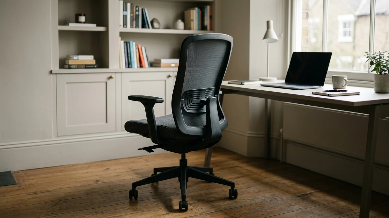 Photorealistic image of office chairs for lumbar support for a UK shortlist buying guide.